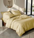 Relax Home Linens beige satin stripe duvet cover set with 1 cm stripes on a bed in a bright modern bedroom